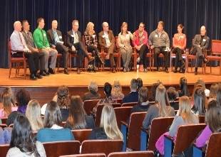 A group of teacher mentors answers questions at a GVSU Education Alumni Network event
